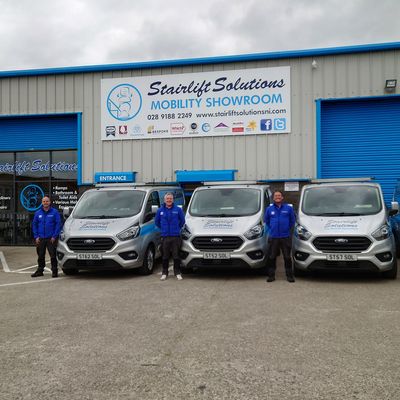 Stairlift Solutions team and vans at the mobility showroom, County Antrim